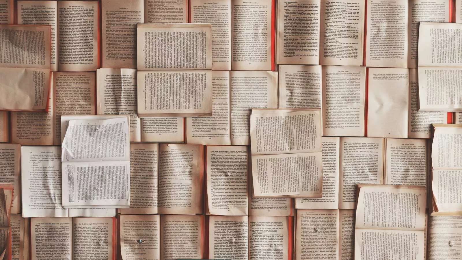 Many open books laid out